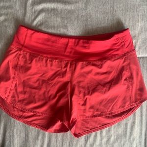 lululemon red/coral running shorts, size 8